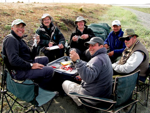Larry, Steve, Humphrey, Ricardo, Gerry and David processing catch of knots