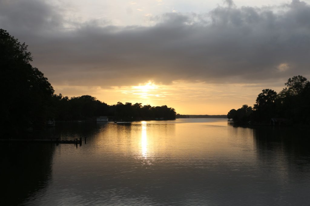 Evening on the Tred Avon River near the town of Oxford Md. Here the tide range is about 2 feet and the water is deep enough for boats almost to the shoreline. 
