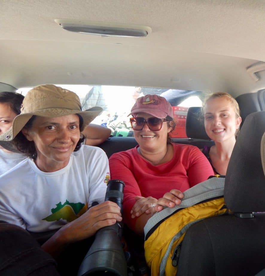 Danielle Paluto, with ICMBio, seated between from left to right, Ana Paul Sousa, Roberta Rodriqous. and ????, Brazilian reserachers supporting ICMBio's mission